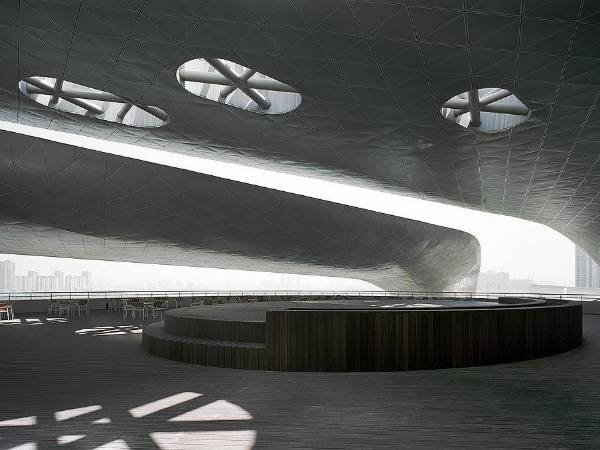 Wuxi Grand Theater's roof decorated with perforated metal sheets