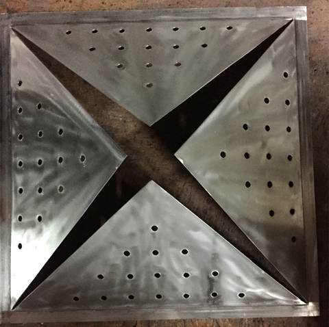 A piece of round hole aluminum perforated sheet with convex four angle star in the middle.