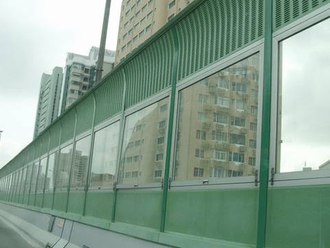 Louver noise barrier on the top, glass panel in the center and micro hole noise barrier on the bottom.