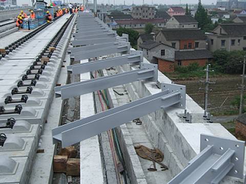 Several H post on the construction site waiting for installation.