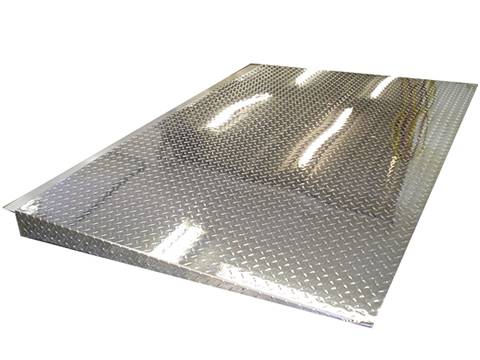 A stainless steel ramp extension with perforated holes.